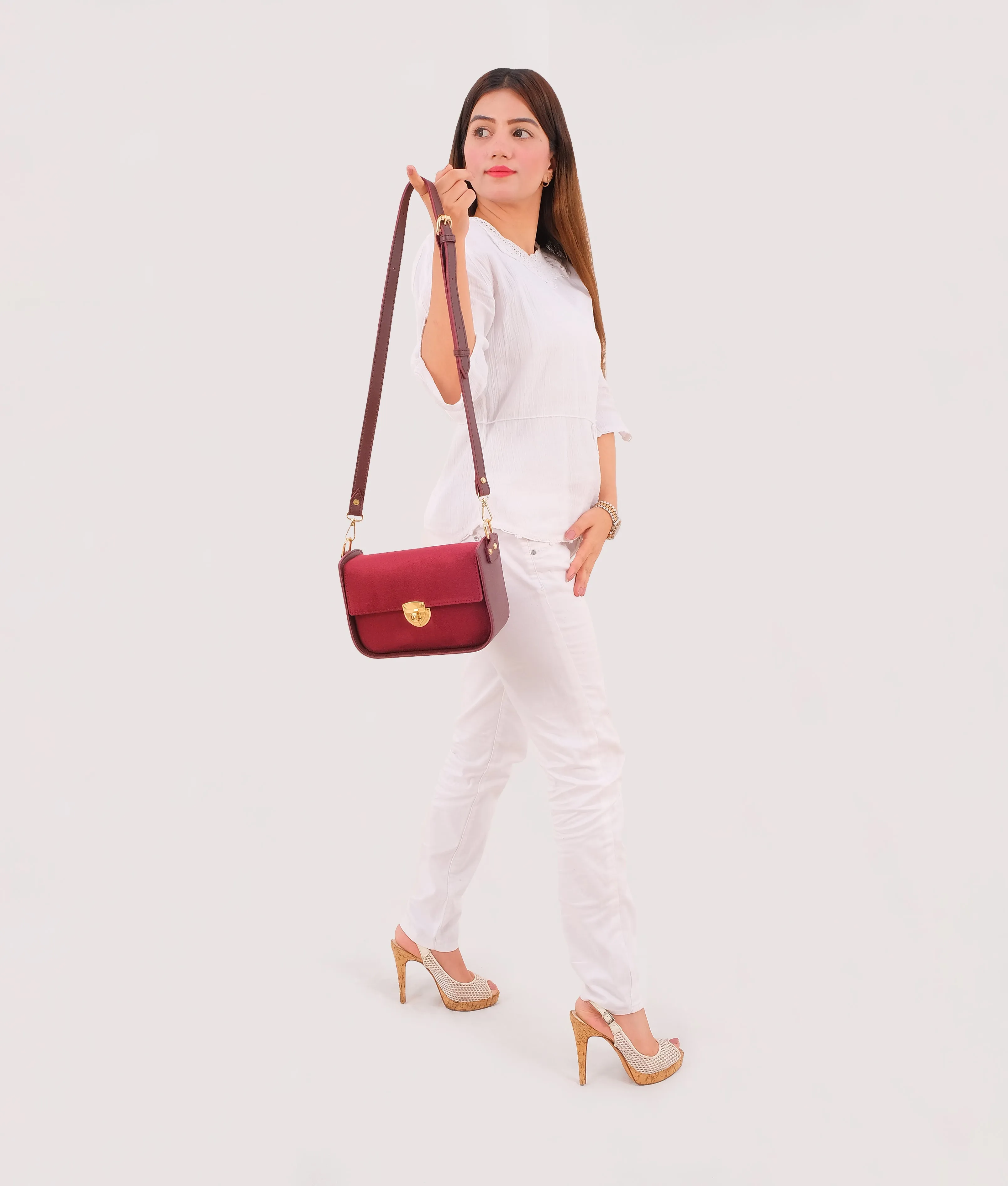 Burgundy suede saddle bag with twist lock